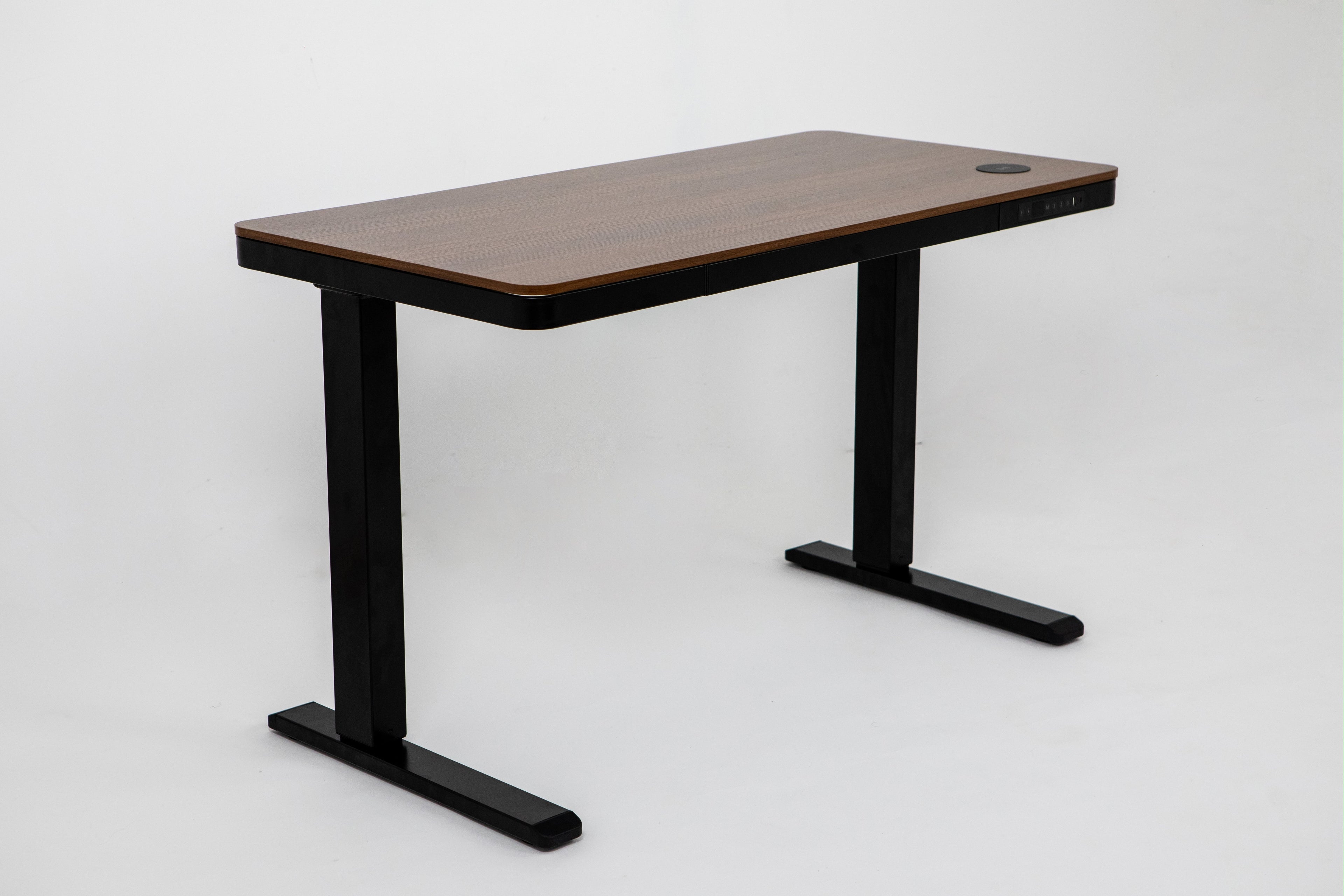 Desk with a wooden top and black metal legs on a white background