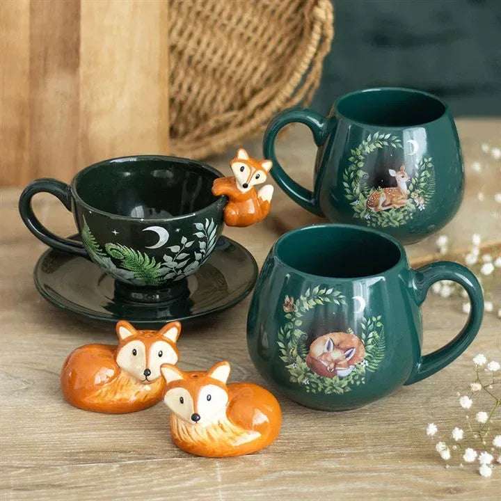 Dark green teacup with saucer and fox handle ornament, fern and moon design