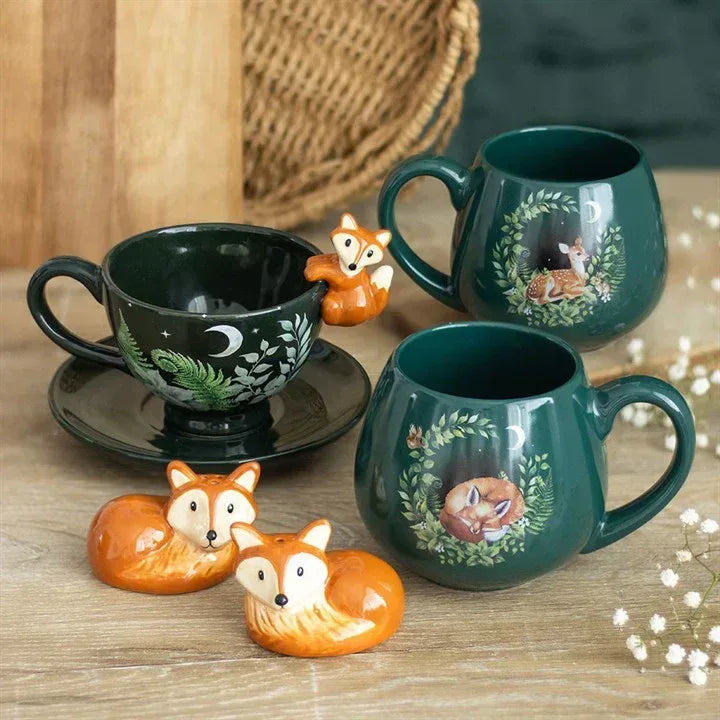 Dark green teacup with saucer and fox handle ornament, fern and moon design