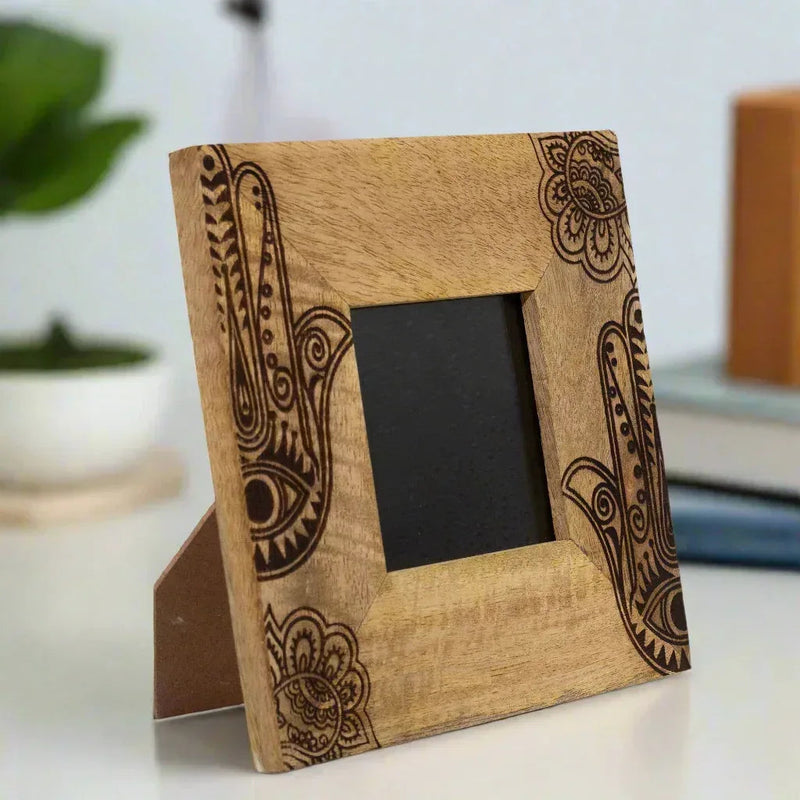 Tabletop mango wood picture frame with black mat and decorative dark carved corners