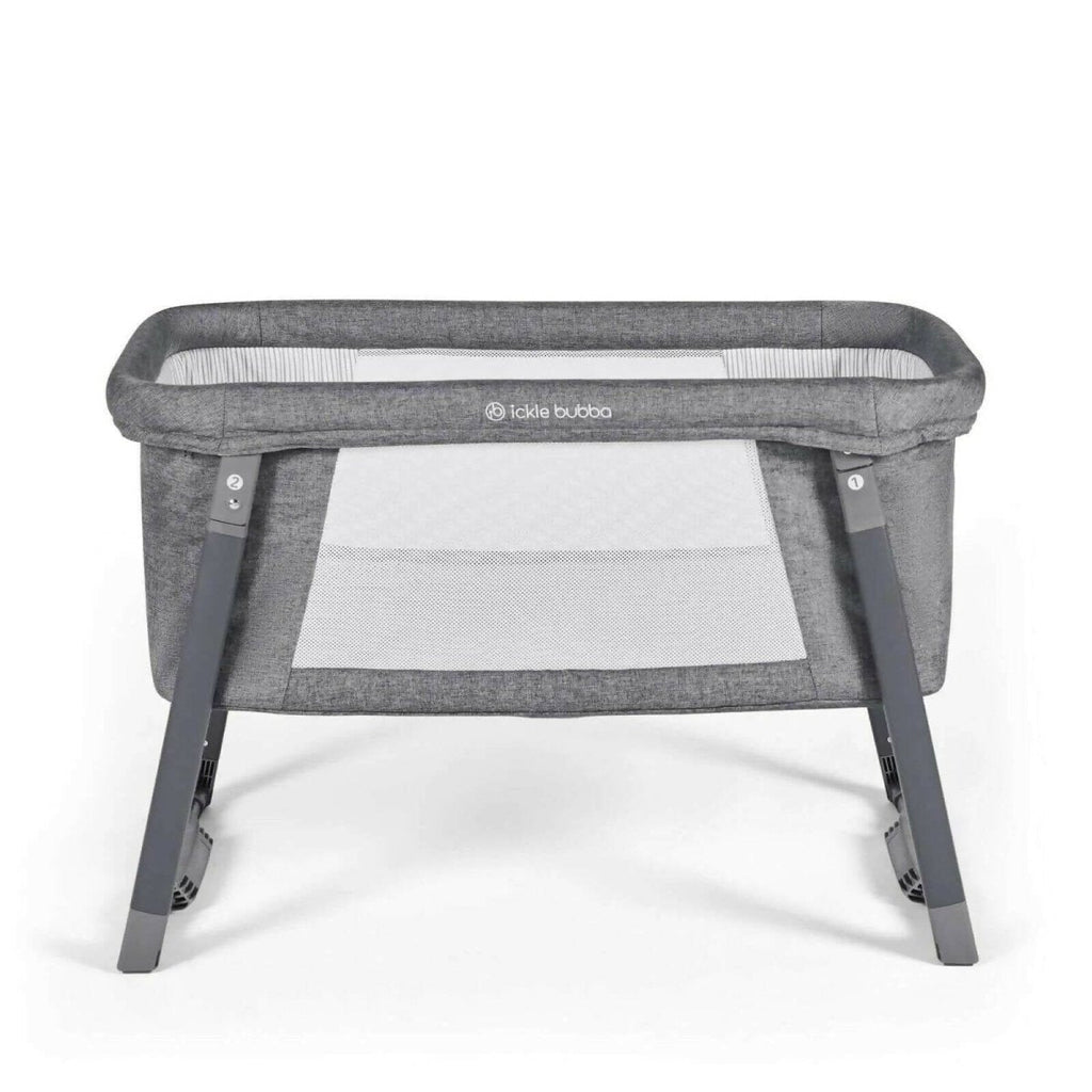 Space Grey mini crib with gray frame and light fabric bassinet insert panel.