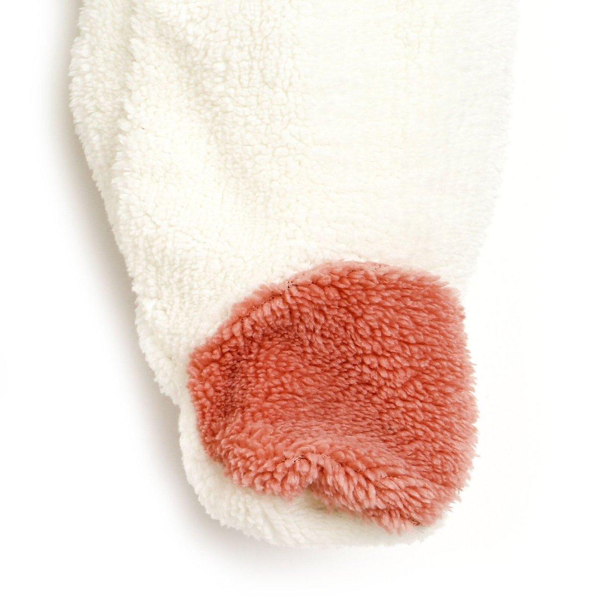Cream footed pant with terracotta toe cuff on plush teddy fleece jumpsuit.