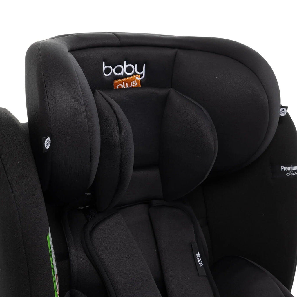 Black car seat headrest and side padding with integrated harness covers