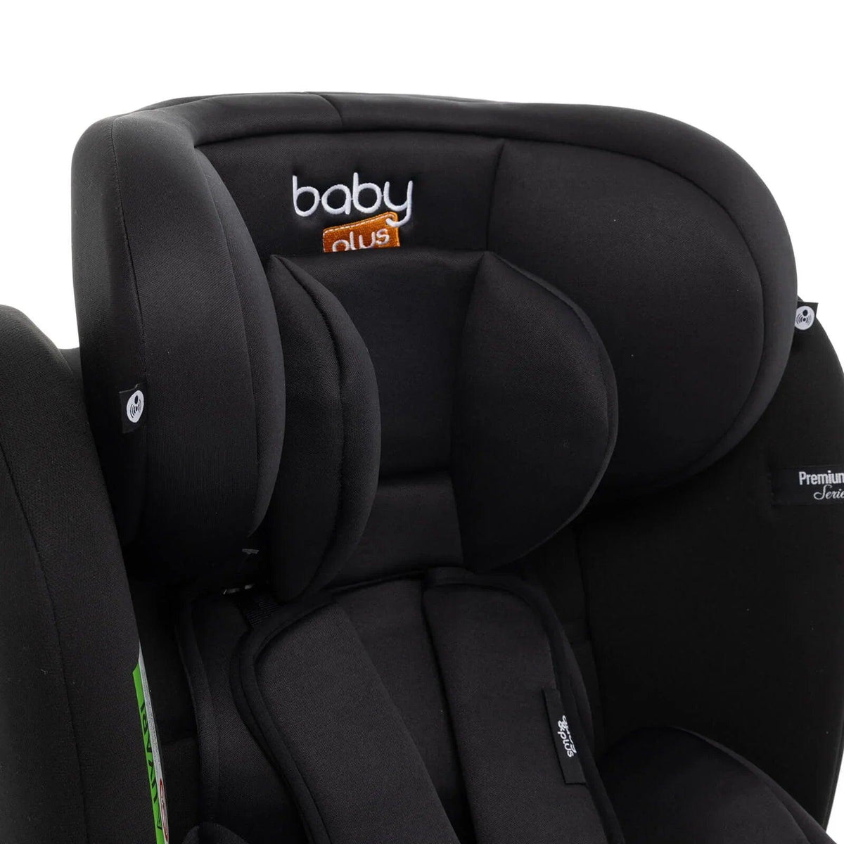 Black car seat headrest and side padding with integrated harness covers
