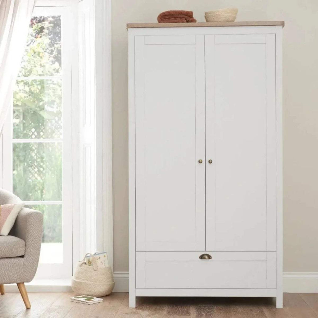 White wardrobe with oak top, double doors, and brass round knobs