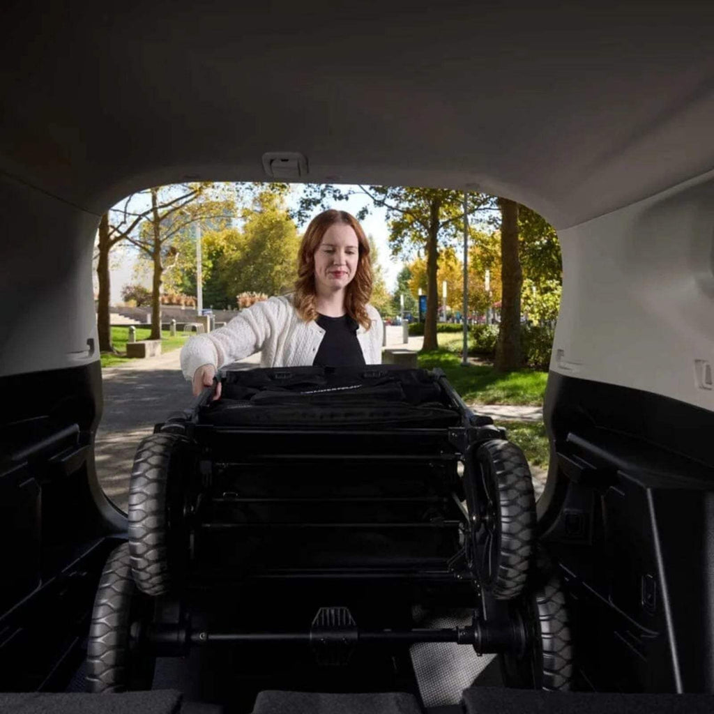 Black stroller wagon interior viewed from rear with open back panel