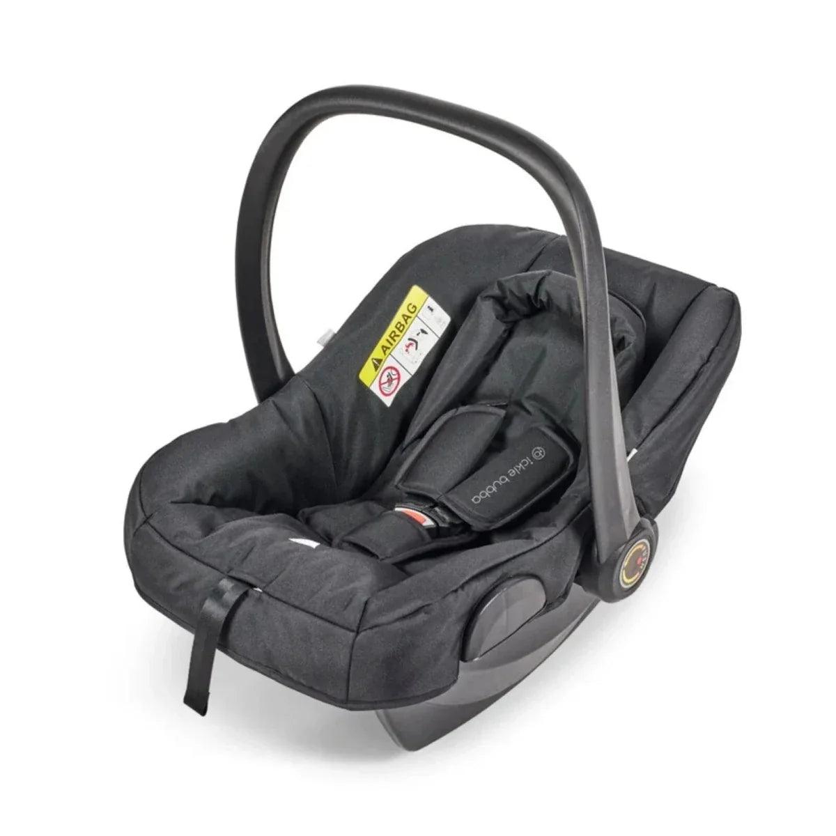 Black infant car seat with carrying handle, padded insert, and harness straps