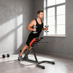 Red and black hyperextension bench with cushioned back and armpad support