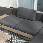Grey L-shaped outdoor sofa with two seat cushions and a tall backrest cushion