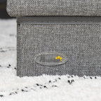 Light grey fabric pet stairs with oval brand logo patch on the step side