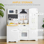 White kids play kitchen with hooks, drawers, stovetop, microwave, and refrigerator