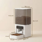 White automatic cat feeder with front dispensing tray and LCD timer display