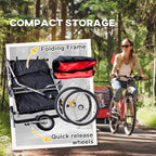 Red bike trailer stroller with folding frame and visible large rear wheel