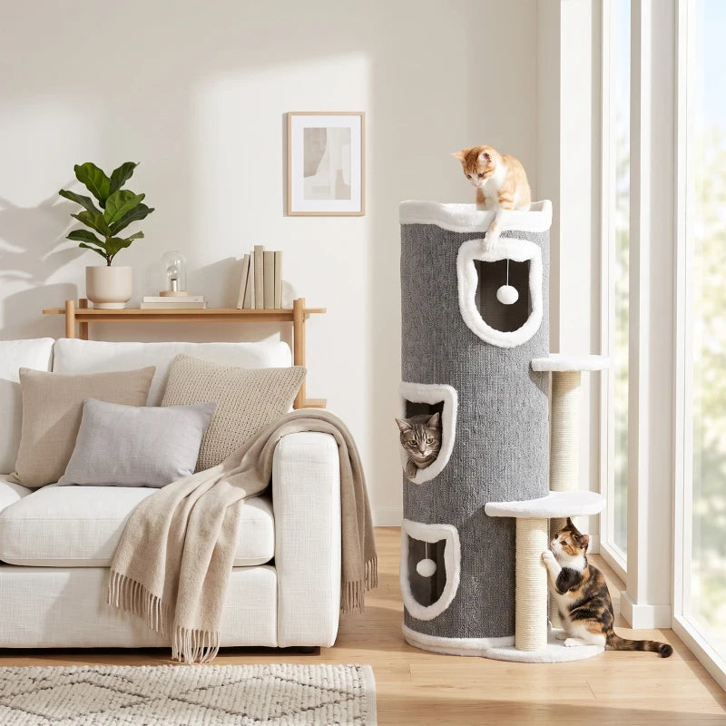 Gray cat tree in living room with three condos and perches, cats resting and climbing