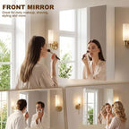 White bathroom mirror cabinet with double doors in use for grooming and makeup