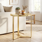 Gold round side table with clear glass top and sleek geometric gold metal base