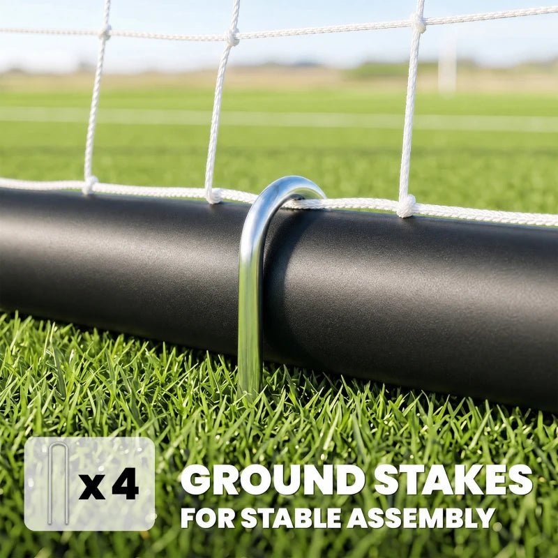 Black football goal frame with ground stakes and net, close-up