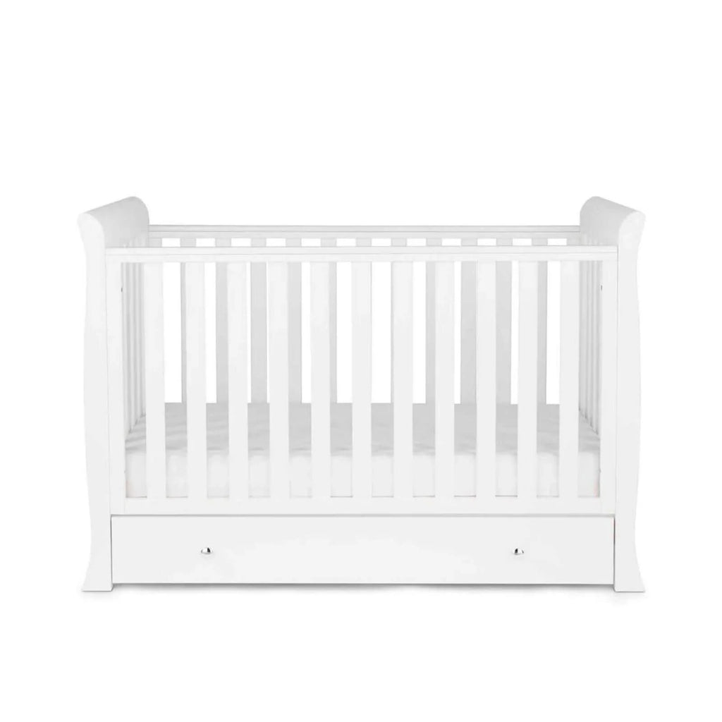 White mini cot bed with front drawer and vertical slats, shown from the side
