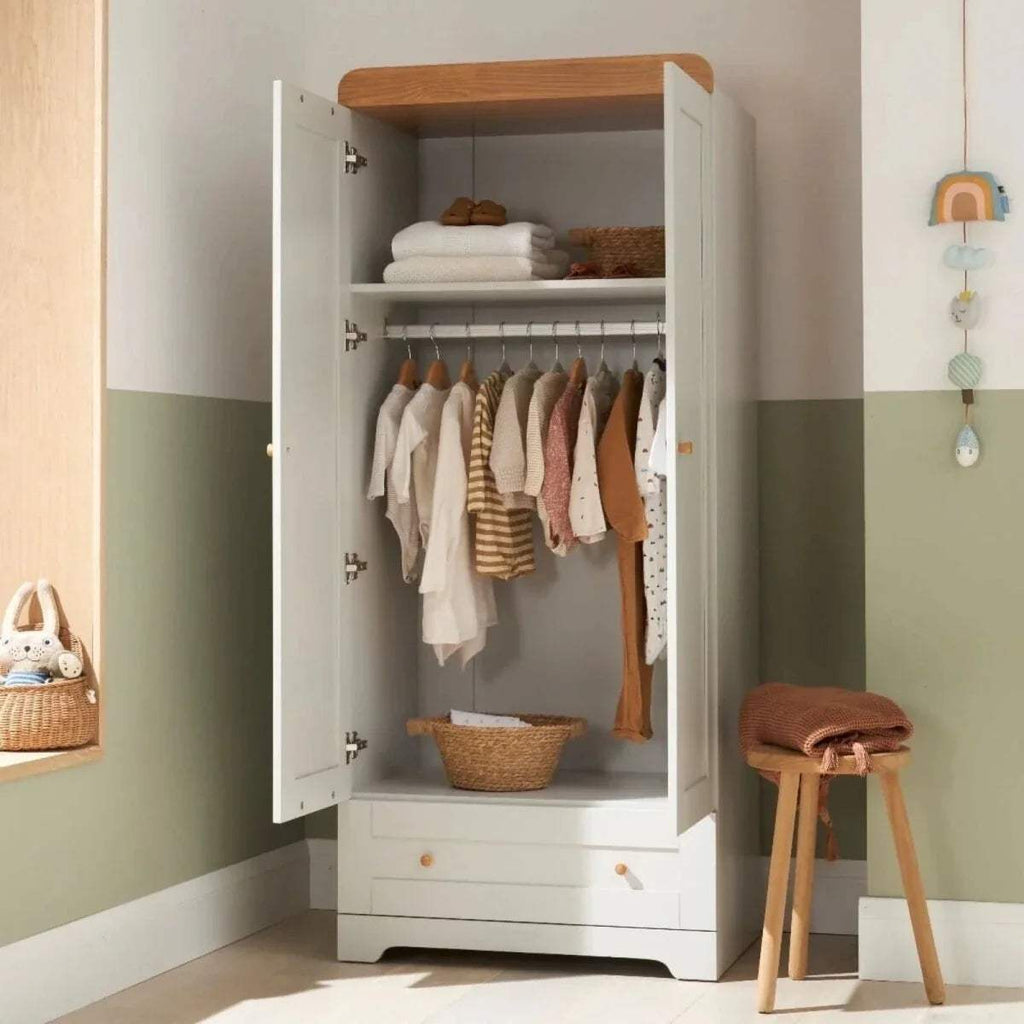 White wardrobe with honey oak top and open door showing hanging rail and shelves