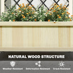 Natural wood raised planter front with dense flowering plants behind the black trellis