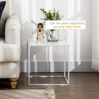 White square side table with open steel frame and tabletop next to a sofa