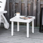 White square plastic patio side table with mug on top