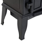 Black electric fireplace stove leg and base corner detail.