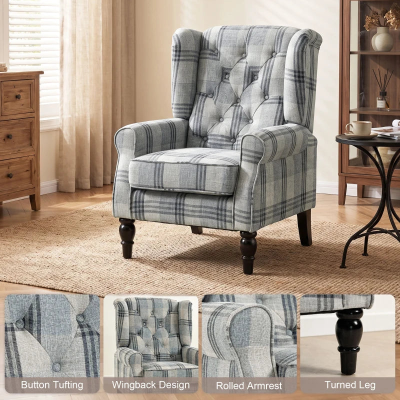 Blue-gray plaid upholstered wingback chair with tufted back and thick seat cushion