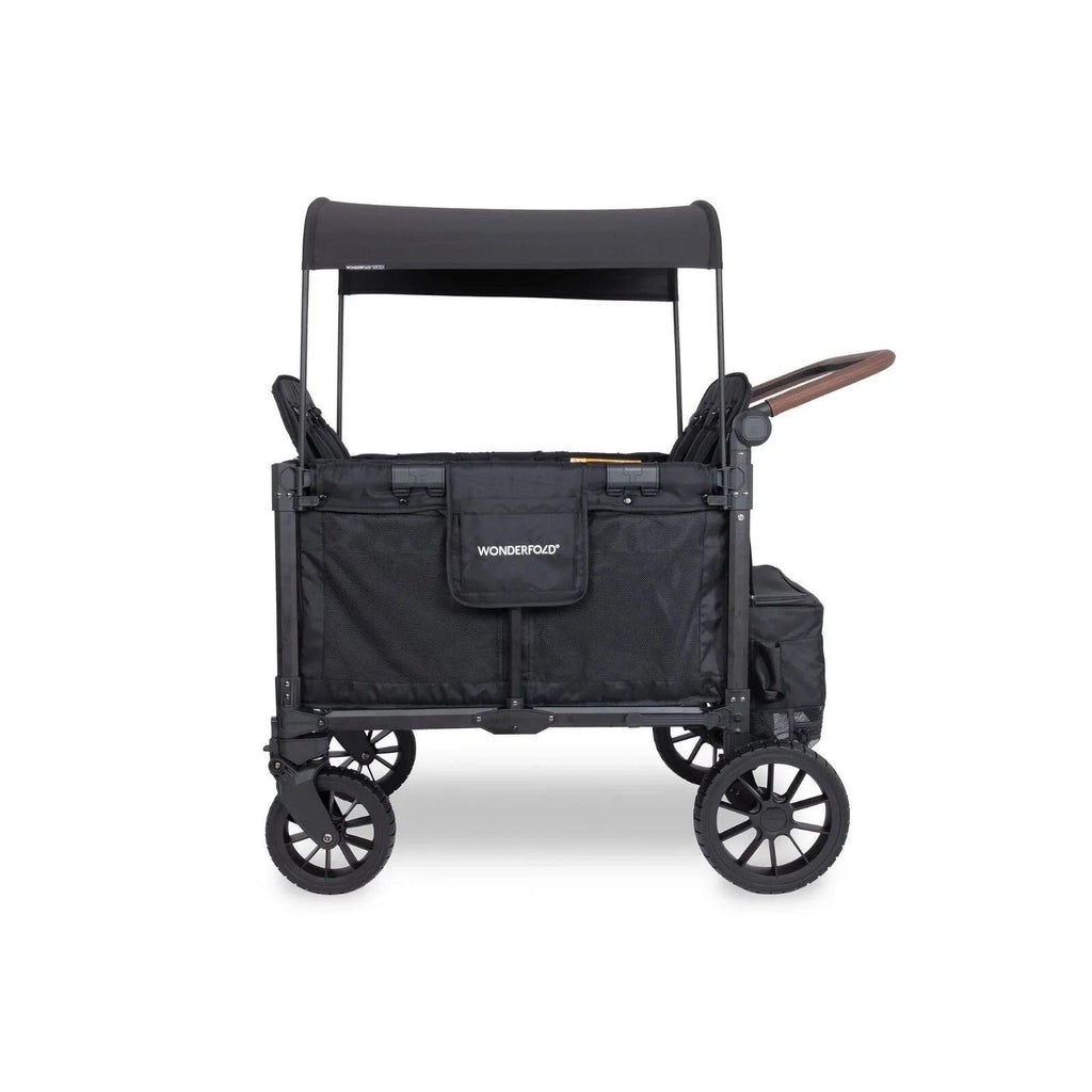 Black stroller wagon side view with canopy, mesh window, and brown handle bar