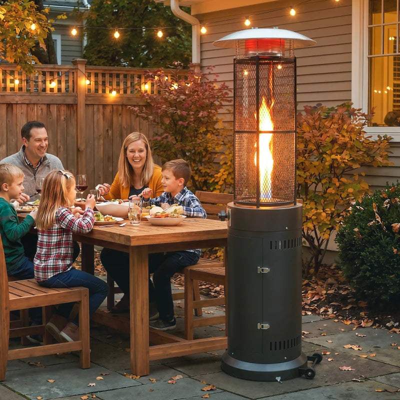 Black freestanding gas patio heater with mesh flame guard and glowing burner flame