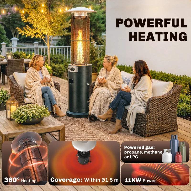 Black freestanding gas patio heater with glowing burner flame and domed top
