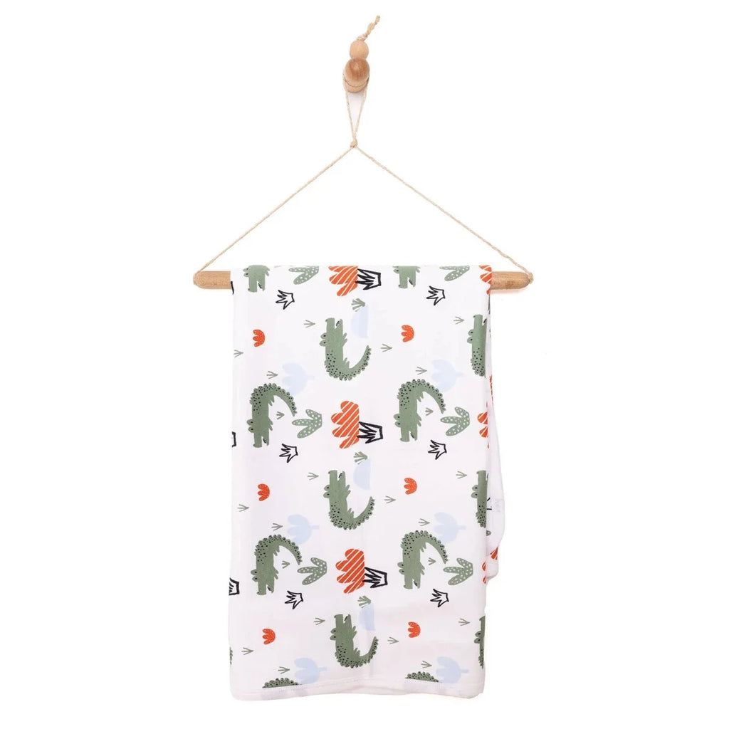 Kids blanket with white base and cactus, arrow, and heart prints