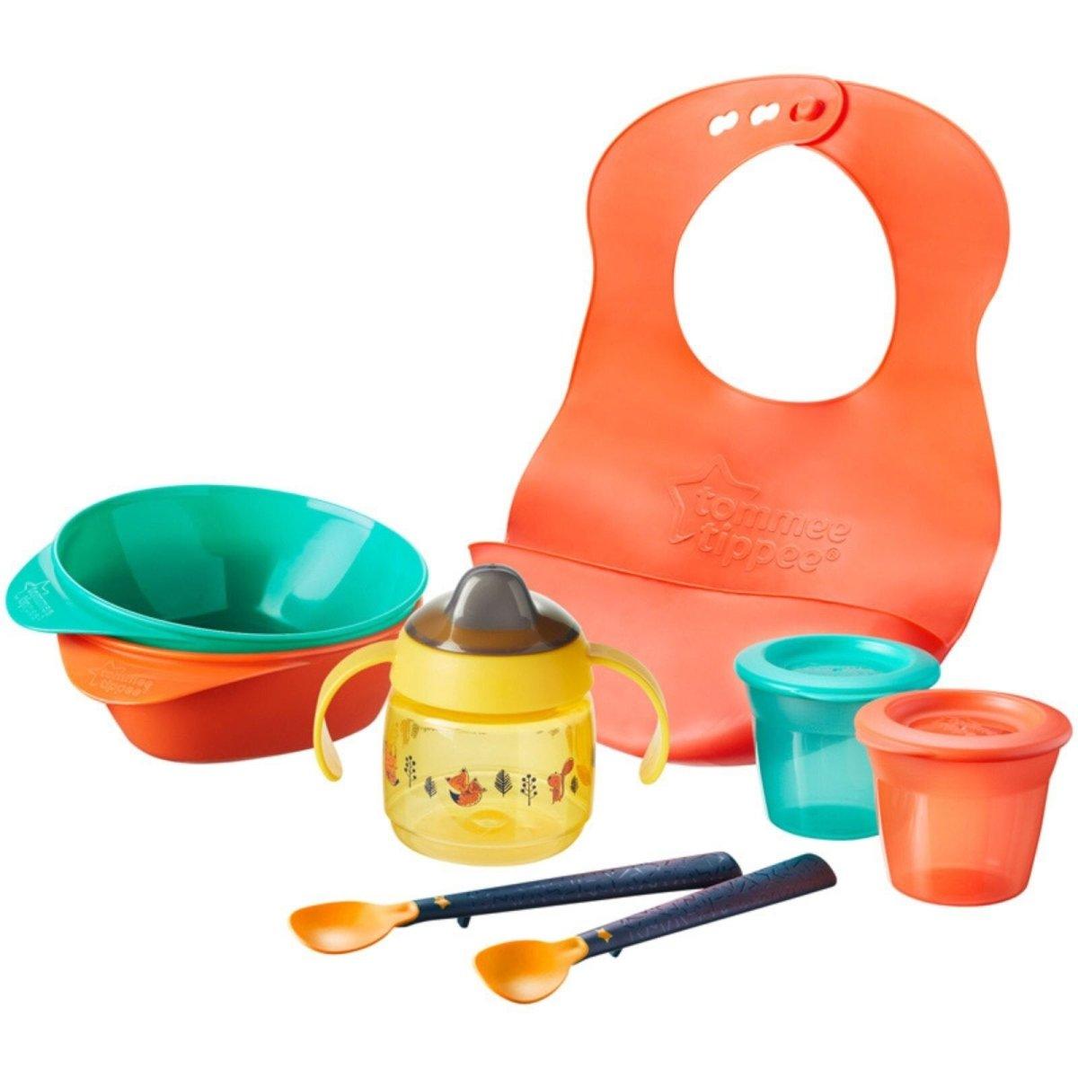 Orange toddler weaning set with silicone bib, cup, bowls, and spoons