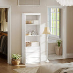 White bookcase with open shelves and drawers, placed near a doorway.