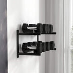 Wall-mounted 2-tier rack with neatly stored dumbbells on the top and bottom shelves