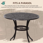 Brown round cast-aluminum dining table with tabletop parasol hole