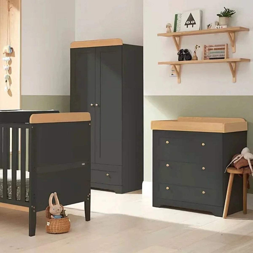 3/4 view slate changing chest with honey oak top, 3 drawers and brass knobs