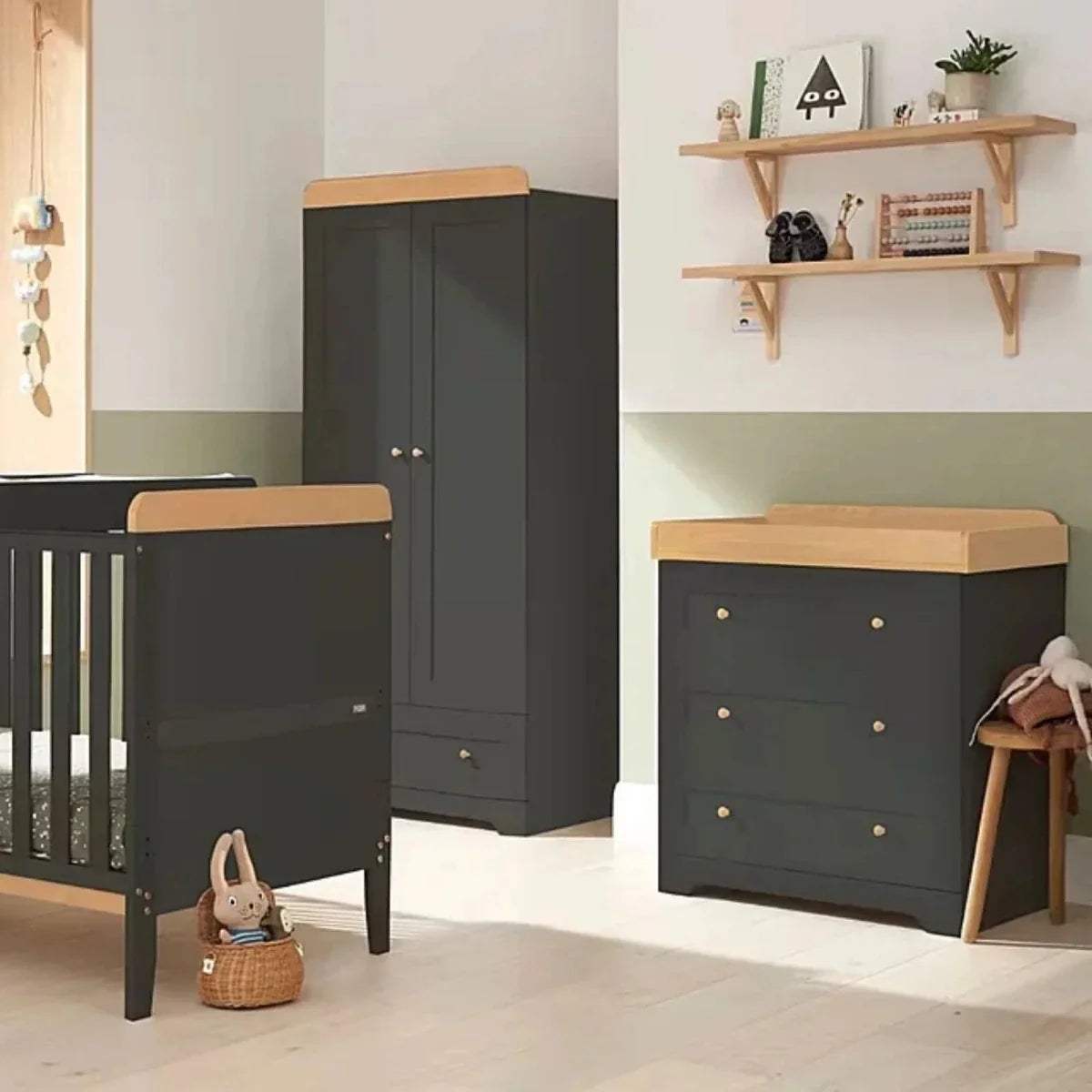 3/4 view slate changing chest with honey oak top, 3 drawers and brass knobs