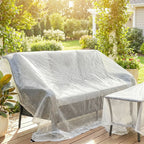 White PE tarpaulin cover over outdoor bench, breathable mesh sheet