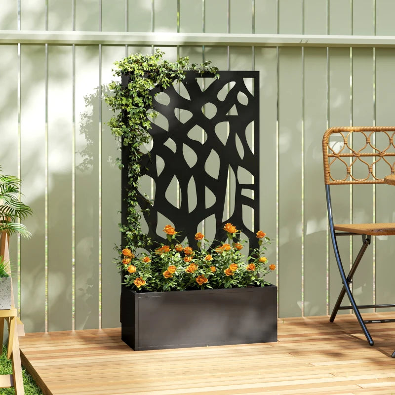 Black metal raised garden planter with trellis privacy screen on wooden patio