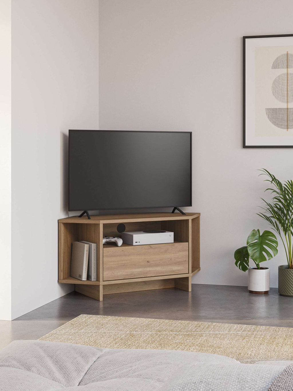 Corner TV unit with open shelves and drawer, oak wood effect, supporting a flat TV.