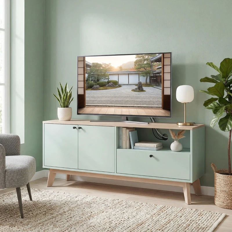 Light green TV cabinet with two doors, open shelf, and drawer, supported by wooden legs