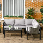 Light grey outdoor sofa with back cushions and dark metal frame on patio