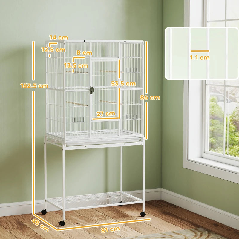 White large bird cage on rolling stand with front storage shelf and side panels
