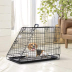 Black wire dog travel crate with removable tray, top handle, and open entrance