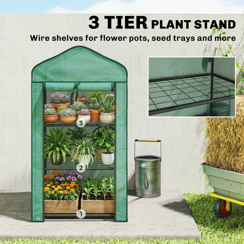 Green three-tier plant stand greenhouse with wire shelves for potted plants