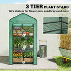 Green three-tier plant stand greenhouse with wire shelves for potted plants
