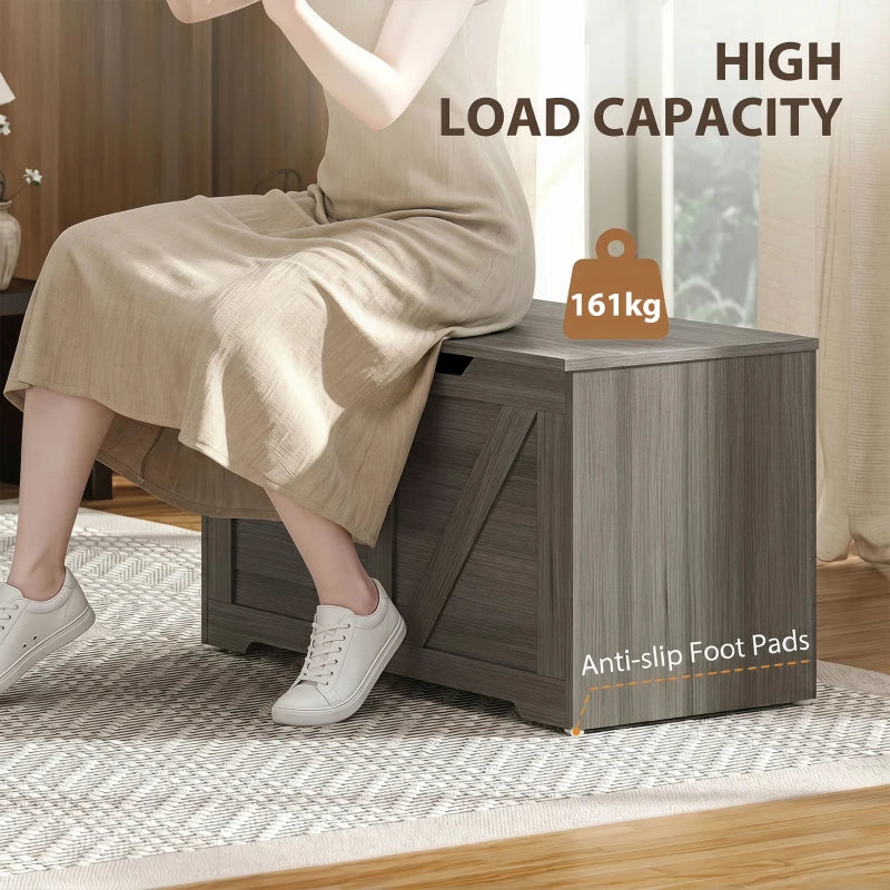Dark grey wood-effect storage box on anti-slip foot pads, lid closed