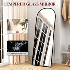 Black full-length tempered glass mirror with arched frame and wide reflective view