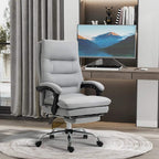 Grey office chair with footrest and cushioned seat, reclined back support, swivel base